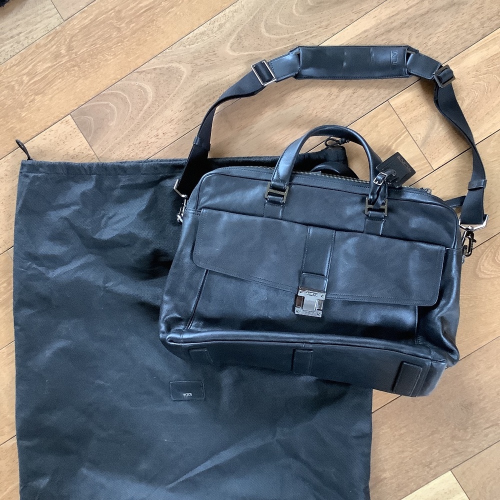 TUMI - Black Leather briefcase/Brand New - never used